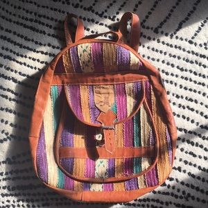 Vintage raffia and leather backpack